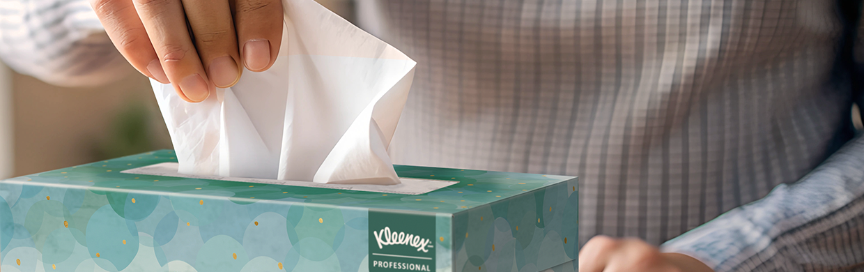 Closeup of a blue decorative box of Kleenex® boutique facial tissues.